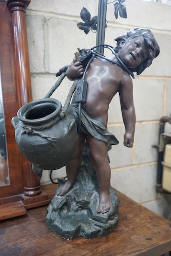 After Auguste Moreau - a bronzed spelter lamp, 